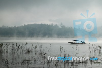 A Man In Boat Stock Photo