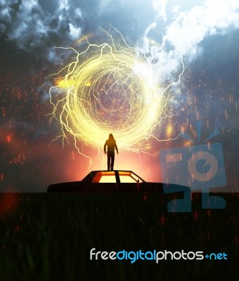 A Man Standing On The Roof Of The Car At Night Stock Image