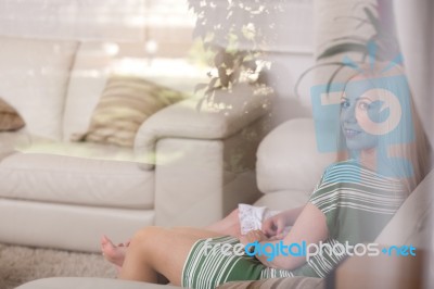 A Mother And Her Little Girl At Home Stock Photo