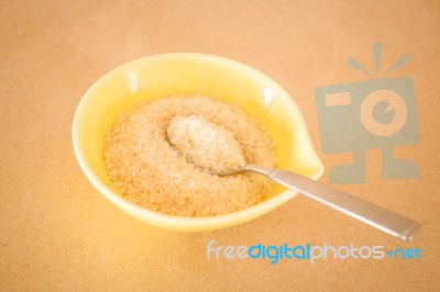 A Pile Of Brown Sugar In Little Bowl Stock Photo