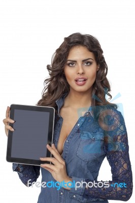 A Young And Happy Girl Holding A Tablet Computer Isolated Stock Photo