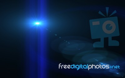 Abstract Blue Digital Lens Flare In Black Background Stock Image