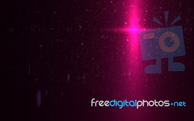 Abstract Digital Lens Flare In Black Background Stock Image