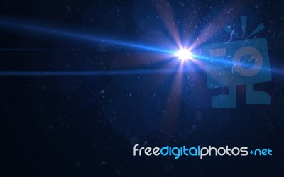 Abstract Digital Lens Flare In Black Background Stock Image