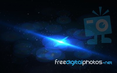 Abstract Digital Lens Flare In Black Background Stock Image