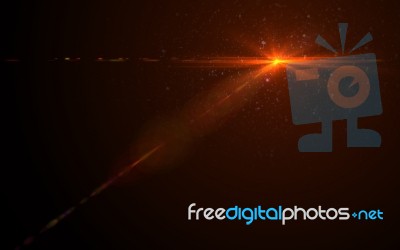 Abstract Digital Lens Flare In Black Background Horizontal Warm Stock Image