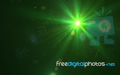 Abstract Green Lens Flare Light Over Black Background Stock Image