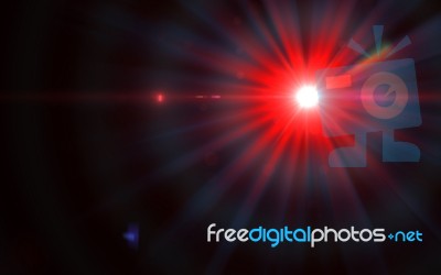 Abstract Green Lens Flare Light Over Black Background Stock Image