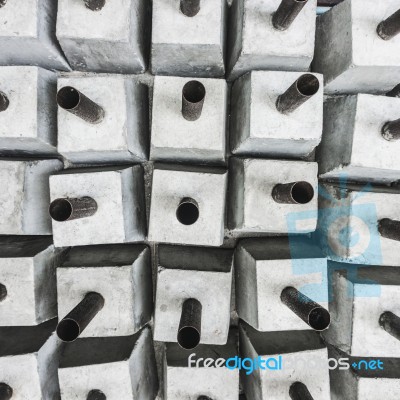 Abstract Iron Post In Concrete Base Background Stock Photo