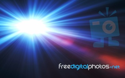 Abstract Large Lens Flare Light Over Black Background Stock Image