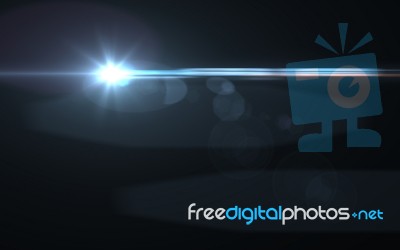 Abstract Lens Flare Light Over Black Background Stock Image