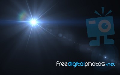 Abstract Lens Flare Light Over Black Background Stock Image