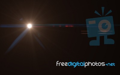 Abstract Of Lighting Digital Lens Flare In Dark Background Stock Image