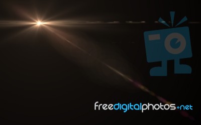 Abstract Sun Burst With Digital Lens Flare Background Stock Image