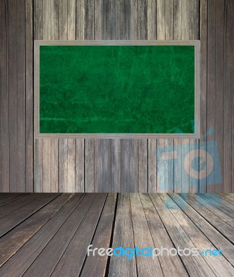 Abstract The Green Blackboard On Grunge Wall Stock Photo