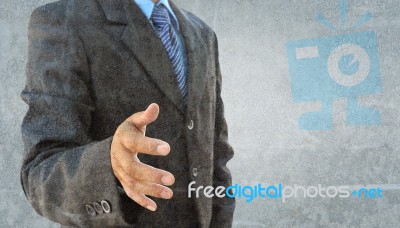 Abstract The Grunge Image Of A Businessman Hand To Shake Stock Photo