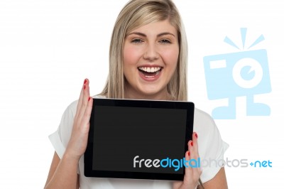 Active Caucasian Girl Displaying Tablet Device Stock Photo