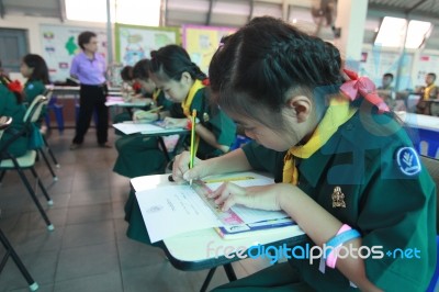 Activity Of Teaching Elementary Students. Elementary Students Are Test Lesson. The Students Intend Exam Stock Photo