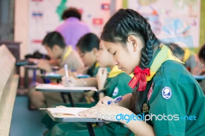 Activity Of Teaching Elementary Students. Elementary Students Are Test Lesson. The Students Intend Exam Stock Photo