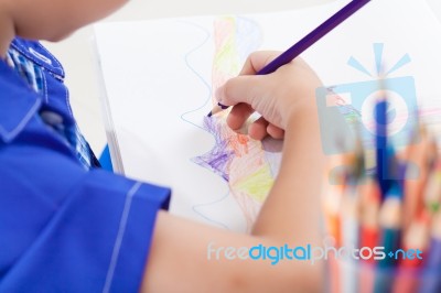 Adorable Boy Drawing Picture Stock Photo