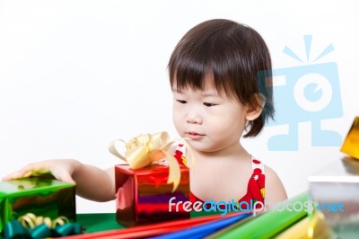 Adorable Little Girl With Present, In New Year Day Stock Photo