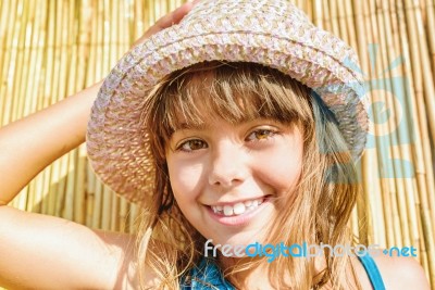 Adorable Little Girl With The Summer Hat Stock Photo