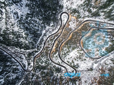 Aerial Snowy Windy Road Stock Photo