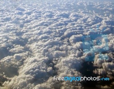 Aerial View Of Earth Covered In Clouds Stock Photo