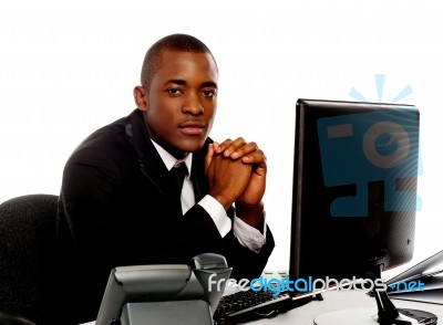 African Businessman With Computer Stock Photo