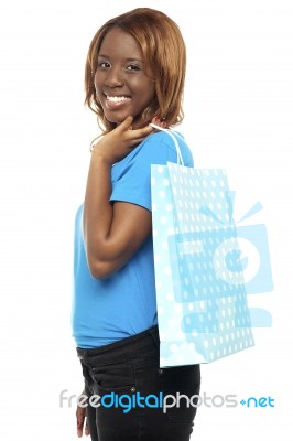 African Girl Holding Shopping Bag Stock Photo