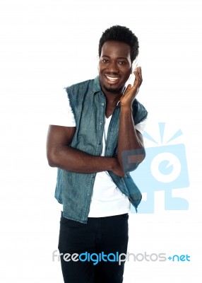 African guy Enjoying Music Stock Photo