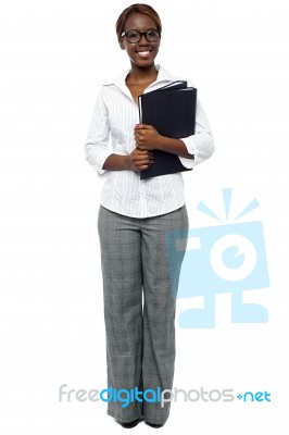 African Lady Executive Holding File Stock Photo