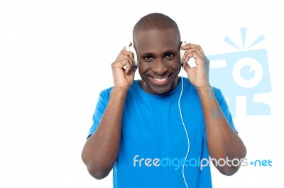 African Man Listen To Music With Headphones Stock Photo