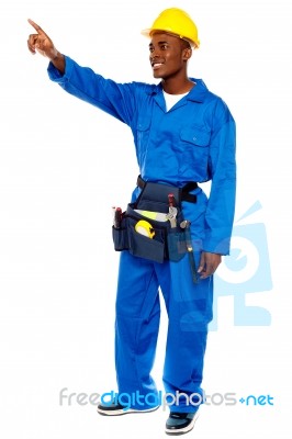 African Man Worker Pointing Forward Stock Photo