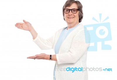 Aged Female Showing Copy Space Stock Photo