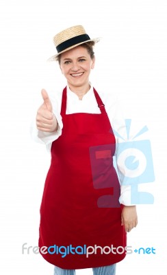 Aged Lady Chef Showing Thumb Up Stock Photo