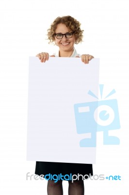 Aged lady showing Blank White card Stock Photo