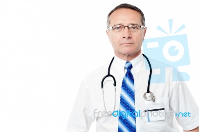 Aged Male Doctor With Lab Coat Stock Photo