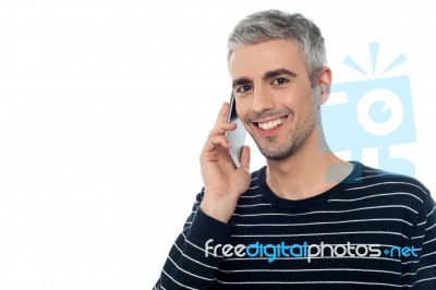 Aged Man Communicating With Friend Stock Photo