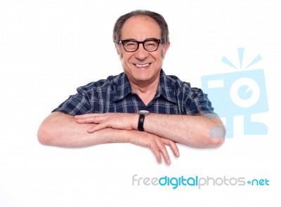 Aged Man Posing With Blank Notice Stock Photo