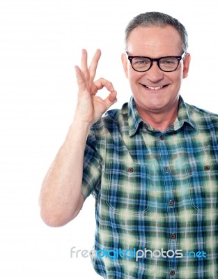 Aged man shows fingers thumb circle Stock Photo