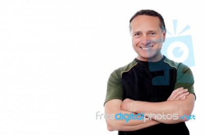 Aged Man With Crossed Hands Stock Photo