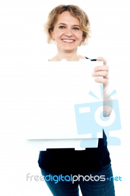 Aged Woman Holding Pizza Box Stock Photo