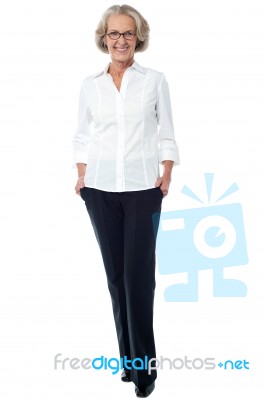 Aged Woman In Corporate Attire Stock Photo