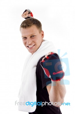 Aggressive Man With Clenched Arm Stock Photo