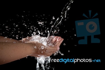 à¹‰hand And Splashing Water On Black Stock Photo