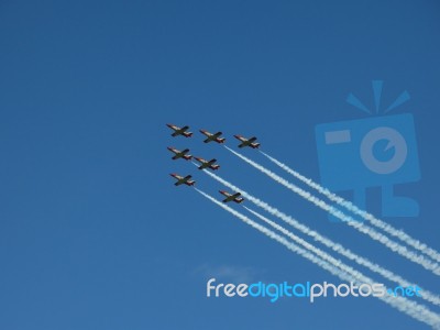 Aircrafts Painting The Blue Sky Stock Photo