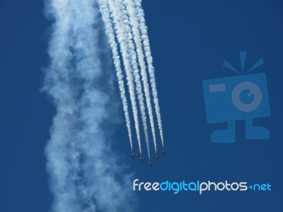 Aircrafts Painting The Blue Sky Stock Photo