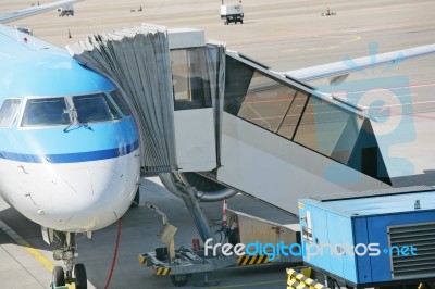 Airplane At An Airport Stock Photo