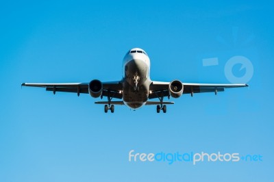 Airplane Landing Stock Photo